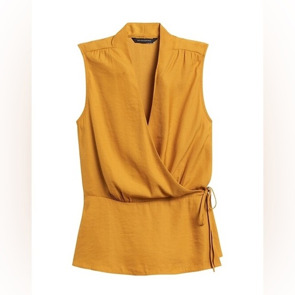 Banana Republic Tops - BANANA REPUBLIC soft mustard yellow wrap shirt, feminine peplum style.